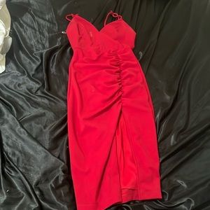 Slit in the front of the dress long and bodyconned.